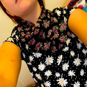 A nice scarf with a bow on the back it is used but in good condition